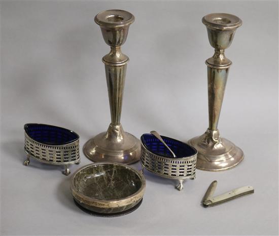 A pair of silver candlesticks (a.f.), pair of silver salts, a silver mounted hardstone dish and a silver fruit knife.